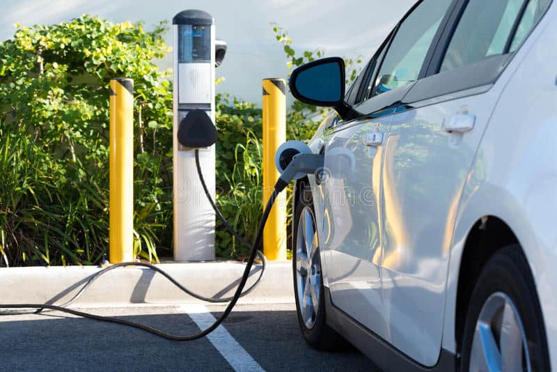 Stock photo of electric cars charging.